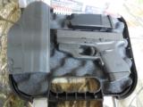 GLOCK
G - 43
9 - MM
WITH
CRIMSON
TACE
LASER,
BLADE - TECH
HOLSTER,
FREE
BATTERIES
FOR
LIFE,
ALL
FACTORY
NEW
IN
BOX - 1 of 25