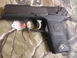 RUGERP-94,40 S & W,PREOWNED( LIKE NEW ),2 - 10ROUNDMAGAZINES,COMBATSIGHTS,AMBIDEXTROUSSAFETY,4.0"BARREL,ALLBLAC - 3 of 20