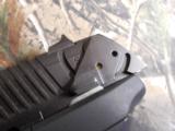 RUGERP-94,40 S & W,PREOWNED( LIKE NEW ),2 - 10ROUNDMAGAZINES,COMBATSIGHTS,AMBIDEXTROUSSAFETY,4.0"BARREL,ALLBLAC - 5 of 20