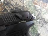 RUGER
P-95
9-MM,
LIKE
NEW,
2 -
15
ROUND
MAGAZINES,
COMBAT
SIGHTS,
THUMB
SAFTEY,
RAIL,
HARD
CASE. - 7 of 17