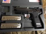 RUGER
P-95
9-MM,
LIKE
NEW,
2 -
15
ROUND
MAGAZINES,
COMBAT
SIGHTS,
THUMB
SAFTEY,
RAIL,
HARD
CASE. - 1 of 17