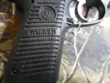 RUGER
P-95
9-MM,
LIKE
NEW,
2 -
15
ROUND
MAGAZINES,
COMBAT
SIGHTS,
THUMB
SAFTEY,
RAIL,
HARD
CASE. - 6 of 17