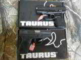 TAURRUS
709
SLIM,
BLACK,
9 - M M,
7 + 1
MAGAZINE,
WHITE
COMBAT
SIGHTS,
3.0"
BARREL,
FACTORY
NEW
IN
BOX - 1 of 23