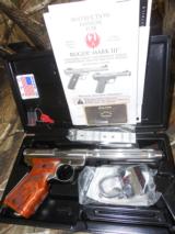 RUGER
MARK
III
HUNTER, WITH
TARGET GRIPS
#10160,
6.8"
BARREL,
S / S,
2 - 10
ROUND
MAGAZINES,
FIBER
OPTIC
SIGHT, FACTORY NEW IN BO - 1 of 26