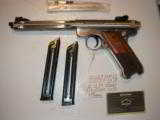 RUGER
MARK
III
HUNTER,
#10118,
6.8"
BARREL,
S / S,
2 - 10
ROUND
MAGAZINES,
FIBER
OPTIC
SIGHT,
FACTORY
NEW
IN
BOX
- 4 of 25