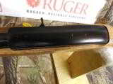 RUGER
MODEL
# 21146,
10 / 22,
22 LR, TIGER
EDITION,
WALNUT
ENGRAVED
STOCK,
(TALO),
1- 10 ROUND
MAG.
NEW IN BOX - 10 of 24