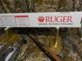 RUGER
MODEL
# 21146,
10 / 22,
22 LR, TIGER
EDITION,
WALNUT
ENGRAVED
STOCK,
(TALO),
1- 10 ROUND
MAG.
NEW IN BOX - 18 of 24