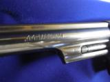 S&W
44
MAGNUM,
MODLE
# 29, DIRTY
HARRY
6.5"
BARREL,
BLUED,
CHECKERED
WOOD
GRIPS,
Comes
With
Wooden
Display Case
FACTORY
NEW
IN
- 7 of 25
