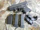 GLOCKG-27GEN -4PER-OWNEDALMOSTNEW,2 - 10 + 1MAGSWITHPINKYREST,NIGHTSIGHTS,3.5"BARREL,WITHCASEAND MANUAL. - 10 of 24
