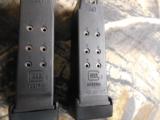 GLOCKG-27GEN -4PER-OWNEDALMOSTNEW,2 - 10 + 1MAGSWITHPINKYREST,NIGHTSIGHTS,3.5"BARREL,WITHCASEAND MANUAL. - 11 of 24