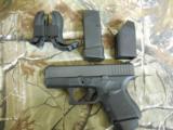 GLOCKG-27GEN -4PER-OWNEDALMOSTNEW,2 - 10 + 1MAGSWITHPINKYREST,NIGHTSIGHTS,3.5"BARREL,WITHCASEAND MANUAL. - 3 of 24