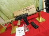 CHIAPPA
AR-15
M - 4,
22
L.R.,
TAN,
WITH
TWO
28
ROUND
MAGAZINES,
ADJUSTABLE
SIGHTS,
FACTORY
NEW
IN
BOX - 3 of 24