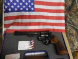 SMITH & WESSON,
DIRTY
HARRY,
MODLE
29,
44
MAGNUM,
COCOBOLO WOOD
GRIPS,
6.5"
BARREL, W
/ Wooden Display Case,
NEW IN BOX - 12 of 25