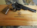 SMITH & WESSON,
DIRTY
HARRY,
MODLE
29,
44
MAGNUM,
COCOBOLO WOOD
GRIPS,
6.5"
BARREL, W
/ Wooden Display Case,
NEW IN BOX - 17 of 25