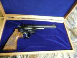 SMITH & WESSON,
DIRTY
HARRY,
MODLE
29,
44
MAGNUM,
COCOBOLO WOOD
GRIPS,
6.5"
BARREL, W
/ Wooden Display Case,
NEW IN BOX - 4 of 25
