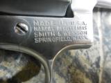 S&WM / 66,STAINLESSSTEEL,357 / 38REVOLVER,4"BARREL6SHOT,WOODGRIPS,ADJUSTABLEREARSIGHT,REDFRONTRAMP,LIKENEW. - 7 of 22