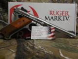 RUGER
MARK
IV
HUNTER,
#40118
S / S,
6.8 "
FLUTED
BULL
BARREL,
22 L.R.,
ADJUSTABLE
SIGHTS,
2 - 10
ROUND
MAGAZINES,
FACTORY NEW
IN - 18 of 25