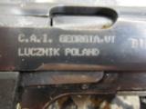 P-83
( NOT P-38 )
PSTL LUCZNIK - P83,
9-MM
MAK,
3.5 "
BARREL, BLUED,
POLISH
MILITARY,
WITH
HOLATER &
EXTER
MAG WITH CLEANING - 9 of 26