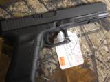 GLOCK
G-34
M.O.S.
GEN. 4,
9 - MM,
WITH
3 - 10
ROUND
MAGAZINES,
FACTORY
NEW
IN
BOX - 14 of 26