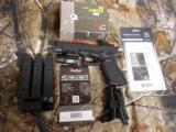 GLOCK
G-34
M.O.S.
GEN. 4,
9 - MM,
WITH
3 - 10
ROUND
MAGAZINES,
FACTORY
NEW
IN
BOX - 5 of 26