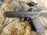 GLOCK
G-34
M.O.S.
GEN. 4,
9 - MM,
WITH
3 - 10
ROUND
MAGAZINES,
FACTORY
NEW
IN
BOX - 19 of 26