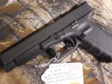 GLOCK
G-34
M.O.S.
GEN. 4,
9 - MM,
WITH
3 - 10
ROUND
MAGAZINES,
FACTORY
NEW
IN
BOX - 12 of 26
