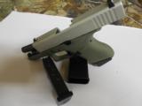 GLOCK
G- 43 USA
9MM, Cerakote
Forest
Green, Cerakote
Shimmering
Aluminum,
2- 6 RD.MAGS,
FACTORY
NEW
IN
BOX - 5 of 24