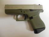 GLOCK
G- 43 USA
9MM, Cerakote
Forest
Green, Cerakote
Shimmering
Aluminum,
2- 6 RD.MAGS,
FACTORY
NEW
IN
BOX - 2 of 24
