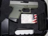 GLOCK
G- 43 USA
9MM, Cerakote
Forest
Green, Cerakote
Shimmering
Aluminum,
2- 6 RD.MAGS,
FACTORY
NEW
IN
BOX - 14 of 24