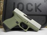 GLOCK
G- 43 USA
9MM, Cerakote
Forest
Green, Cerakote
Shimmering
Aluminum,
2- 6 RD.MAGS,
FACTORY
NEW
IN
BOX - 10 of 24