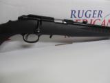 RUGER
AMERICAN,
22 - L. R. BOLT ACTION,
ADJUSTABLE
SIGHT,
TAKES
ALL
10/22 MAGAZINES,
FACTORY
NEW
IN
BOX - 5 of 25