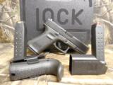 GLOCK
GEN - 5,
G-19,
THE
NEW
GENERATION
JUST
OUT.
9-MM,
3 - 15
ROUND
MAGS., Interchangeable Backstrap,
NEW
IN
BOX. - 14 of 25