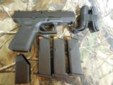 GLOCK
GEN - 5,
G-19,
THE
NEW
GENERATION
JUST
OUT.
9-MM,
3 - 15
ROUND
MAGS., Interchangeable Backstrap,
NEW
IN
BOX. - 3 of 25