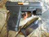 TAURUS
PT 111 GEN 2,
9-MM
WITH
LASER,
2- 12 ROUND
MAGAZINES,
COMBAT
SIGHTS.
3.3"
BARREL,
FACTROY
NEW
IN
BOX.. - 3 of 25