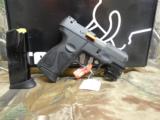 TAURUS
PT 111 GEN 2,
9-MM
WITH
LASER,
2- 12 ROUND
MAGAZINES,
COMBAT
SIGHTS.
3.3"
BARREL,
FACTROY
NEW
IN
BOX.. - 15 of 25