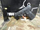 TAURUS
PT 111 GEN 2,
9-MM
WITH
LASER,
2- 12 ROUND
MAGAZINES,
COMBAT
SIGHTS.
3.3"
BARREL,
FACTROY
NEW
IN
BOX.. - 16 of 25