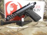 RUGER
MARK
IV, 22/45
LITE
22 L.R
#43918
4.4"
BARREL. BULL,
THREADED
DMD
GRAY
TWO
10
ROUND
MAGS,
ADJUSTABLE
SIGHTS,
- 13 of 22