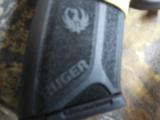 RUGER
SECURITY - 9
#03810,
9 - MM,
TWO - 15
ROUND
MAGAZINES,
WHITH
OUTLINE
SIGHTS, - 8 of 20