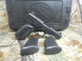 FN
FIVE - SEVEN
5.7 M-M X28,
BLACK,
3 - 20
ROUND
MAGAZINES,
ADJUSTABLE
SIGHTS,
UNDER
RAIL,
FACTORY
NEW
IN
BOX !!!!! - 3 of 24