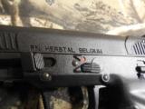FN
FIVE - SEVEN
5.7 M-M X28,
BLACK,
3 - 20
ROUND
MAGAZINES,
ADJUSTABLE
SIGHTS,
UNDER
RAIL,
FACTORY
NEW
IN
BOX !!!!! - 8 of 24