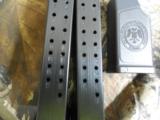 CENTURY
ARMS,
9 - MM,
BURNT
BRONZE, 2-18
ROUND
MAGAZINES,
PADDEL
HOLSTER,
MAG
LOADER,
COMBAT
SIGHTS,
BURNT
BRONZE, FACTORY
NEW
IN
BOX - 13 of 24