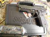 SIG
SAUER
P229
9MM
CLASSIC
CARRY,
3.9"
BARREL,
SIGLITE,
3-13+1
RIUND
MAGAZINES,
NIGHT
SIGHTS,
G10
(TALO)
NEW
IN
BOX - 17 of 25