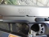RUGER
1911
SR 10,--
S / S,
10 - MM,
2 - 8 ROUND
MAGAZINES,
5 "
BARREL,
BOMER
STLYE
ADJUSTABLE
SIGHTS,
FACTORY
NEW
IN
BOX - 8 of 25