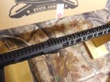 P,S,A,
AR-15
COMPLETE
UPPER,
IN
9 - MM,
USES
GLOCK
MAGAZINES,
16"
BARREL,
NITRIED,
13.5"
LIGHTWEIGHT
M-LOC
RAIL,
1 IN 10
- 6 of 18