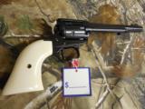 HERITAGE ROUGH RIDER
RR22B6 22
L.R. REVOLVER, 6 SHOT, WHITE GRIPS, 6.5" BARREL, FACTORY NEW
IN
BOX - 2 of 12