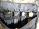 LARGE
PISTOL
2- GUN
CASES,
WITH
MAGAZINE
HOLDERS,
3- POUCHES,
BLACK
WITH
2- CARRING
STRAPS
!!! - 5 of 12