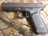 GLOCK,
MODEL: GEN 4 17 FS,
9-MM, NEW
RECEIVER
WITH
FRONT &
REAR
FINGER GROOVERS,
(Slide Serrations)
3-17
ROUND
MAGAZINES,
NEW IN B - 4 of 23