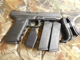 GLOCK
G-41, GEN - 4,
45 ACP,
5.31"
BARREL,
3 - 13
ROUND
MAGAZINES,
4- ITERCHANGEABLE BACK STRAPS,
FACTORY NEW IN BOX !!! - 3 of 22