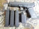 GLOCK
G-41, GEN - 4,
45 ACP,
5.31"
BARREL,
3 - 13
ROUND
MAGAZINES,
4- ITERCHANGEABLE BACK STRAPS,
FACTORY NEW IN BOX !!! - 12 of 22