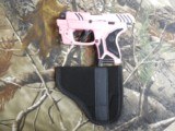 RUGER
LCP II,
WITH
VIRIDIAN
RED
LASER, &
CARRING
POUCH,
380
ACP,
PINK / BLACK
CUSTOM
CERAKOTING,
6+1
ROUND
MAGAZINE,
NEW
IN
BOX. - 7 of 20